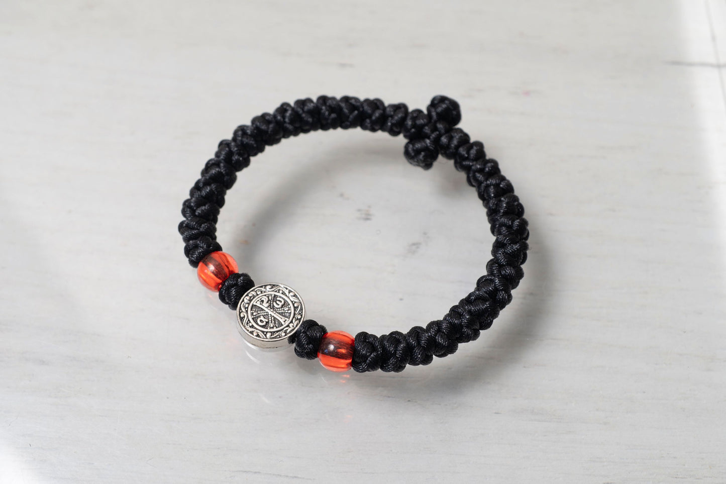 Elastic Prayer Rope Komboskini Bracelet with Chi-Rho Medallion and Red Beads - 33 Knots - Black Cord