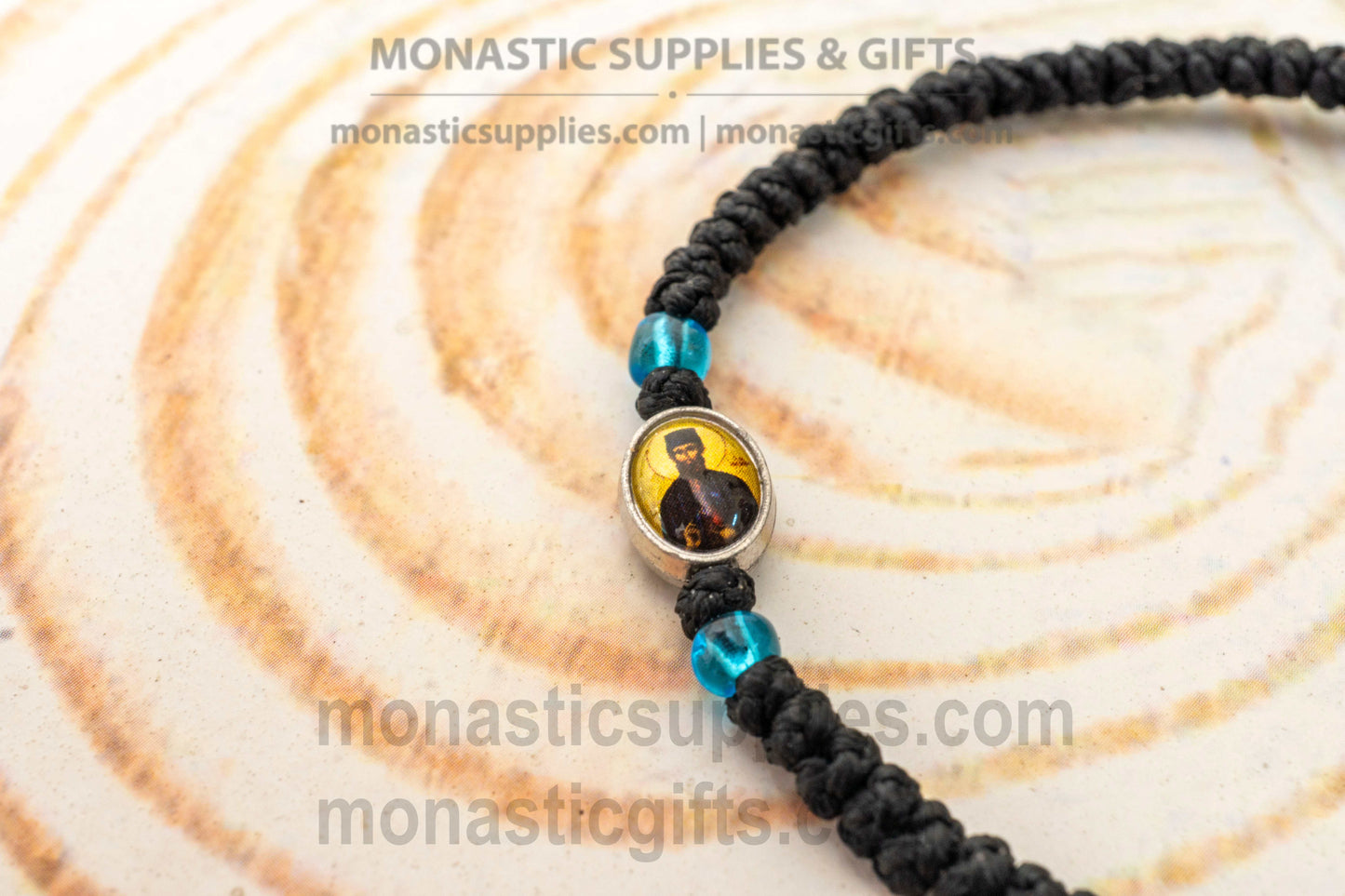 Handcrafted Orthodox black waxed cord 33 knot prayer rope bracelet with tiny Saint Ephraim icon medallion and knotted cross
