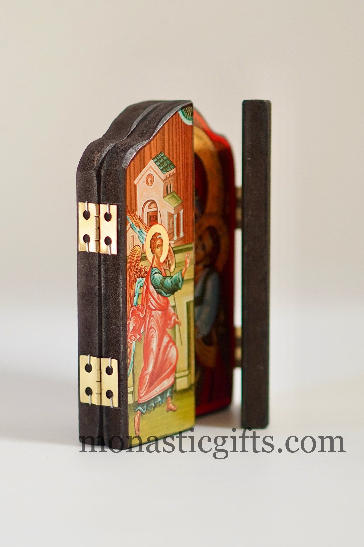 Triptych wooden Icon with Resurrection of Jesus Christ with Archangels and narrative of the Virgin Mary's Annunciation on the outside.