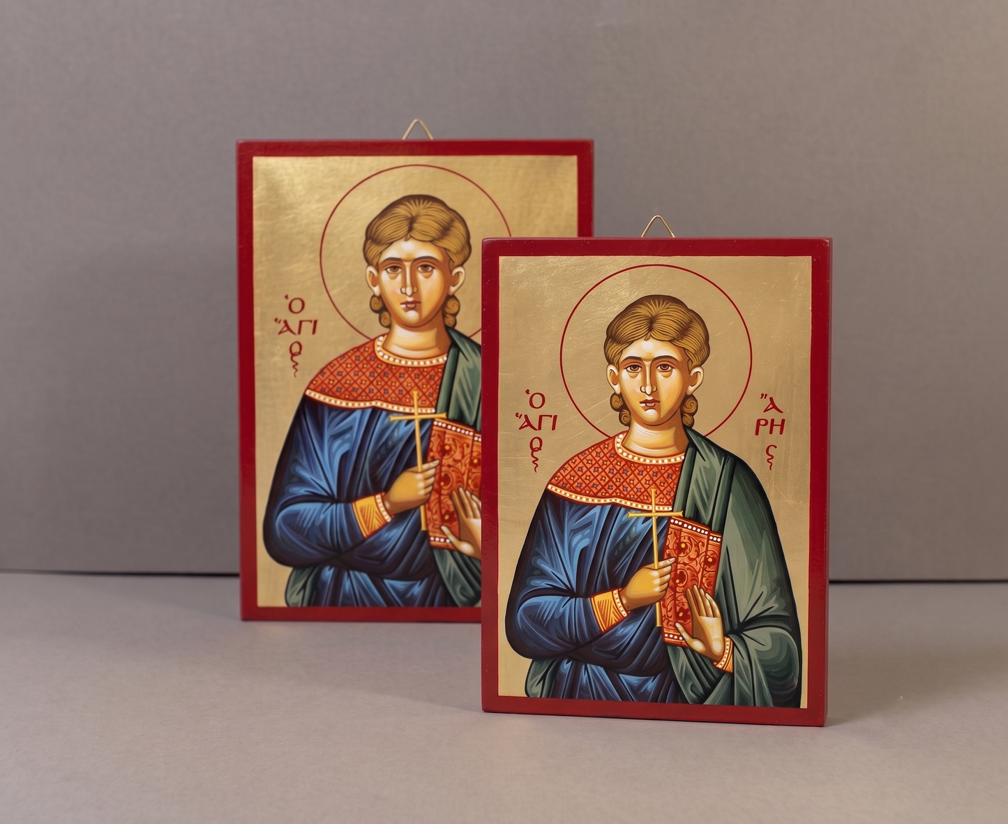 Handcrafted Orthodox gold leaf canvas icon of Saint Aris on solid wooden panel