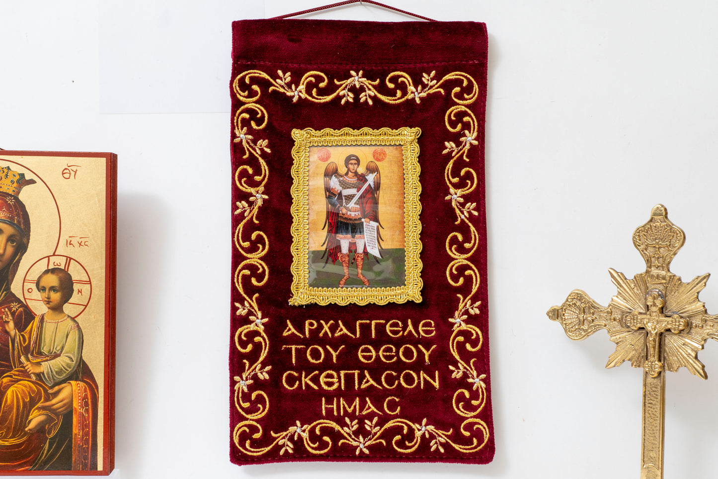 Handcrafted burgundy velvet wall hanging banner of Archangel Michael with gold embroidery for home iconostasis