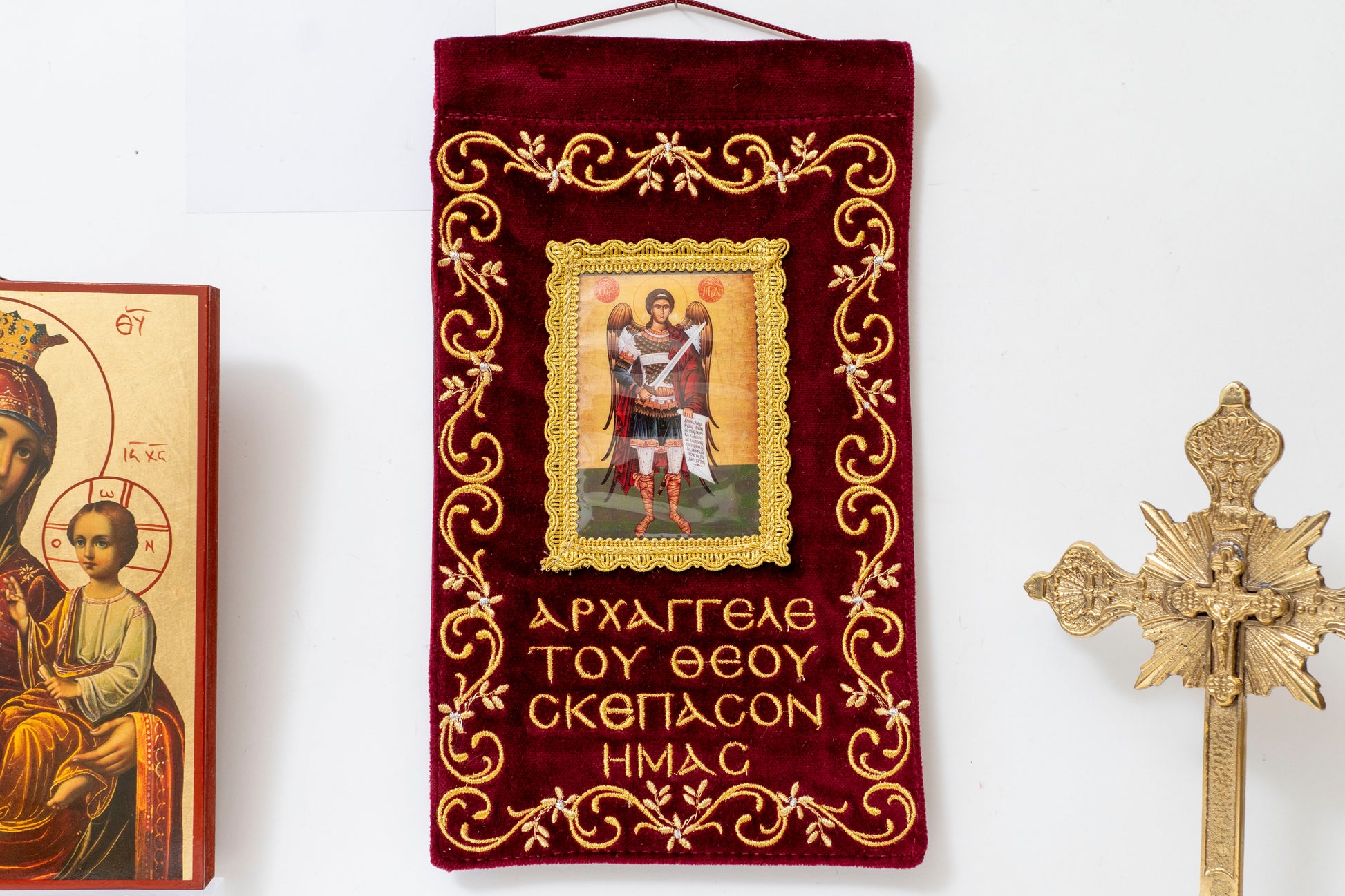 Handcrafted burgundy velvet wall hanging banner of Archangel Michael with gold embroidery for home iconostasis