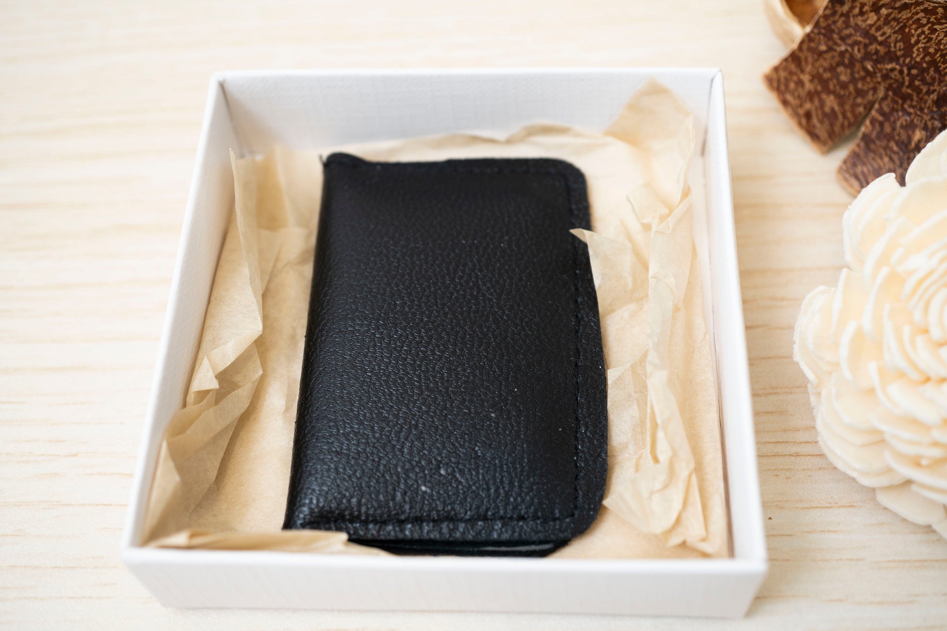 Handcrafted black leather Orthodox diptych icon folded inside a premium white gift box