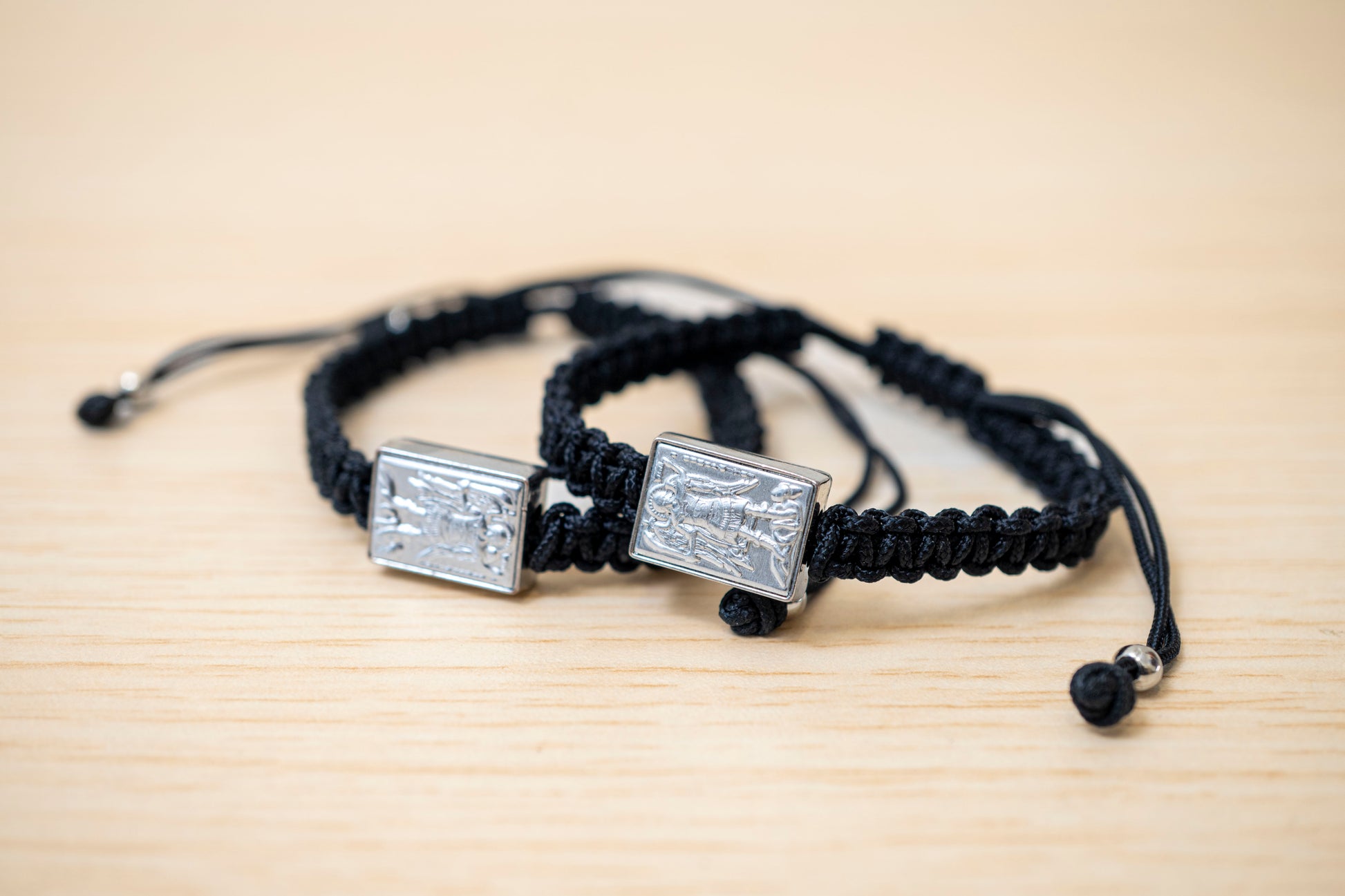 Orthodox macrame prayer bracelet with a silver Archangel Michael icon.