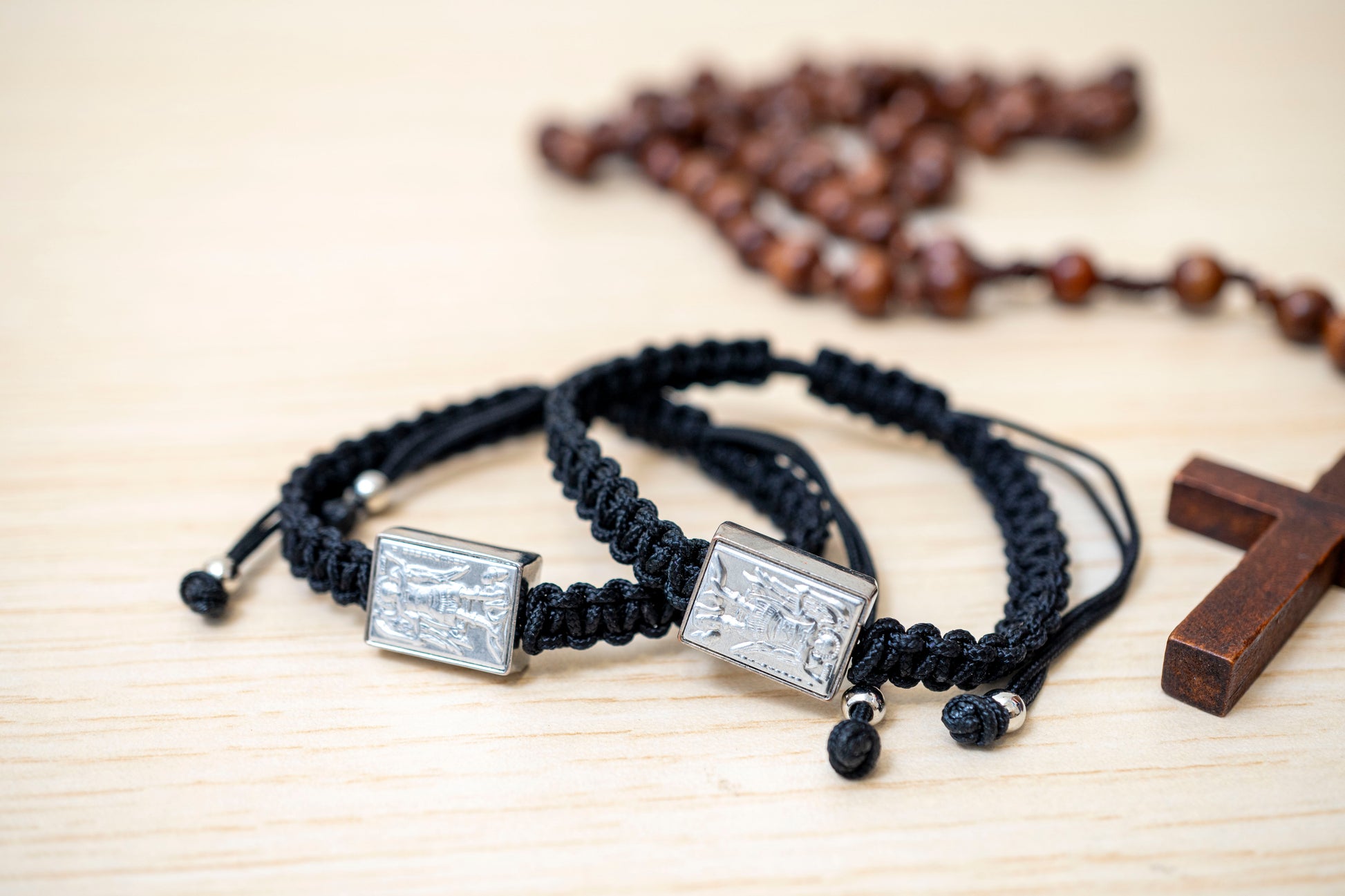 Orthodox macrame prayer bracelet with a silver Archangel Michael icon.