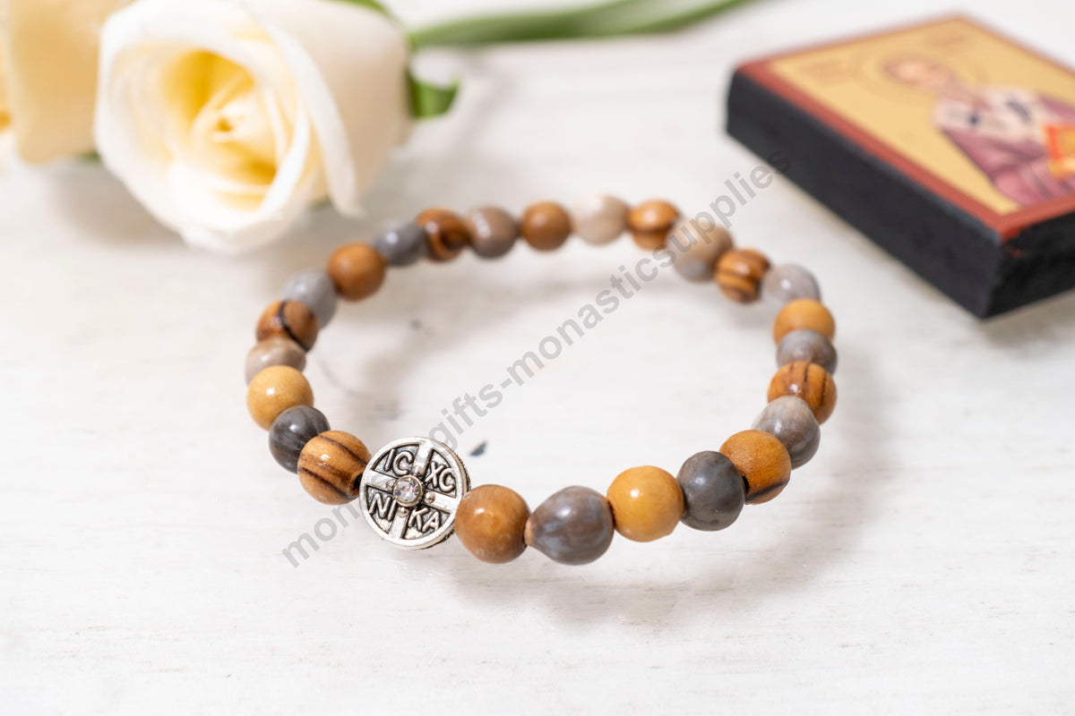 Tears of the Virgin Mary prayer bracelet with natural wood beads and IC XC NIKA crystal medallion