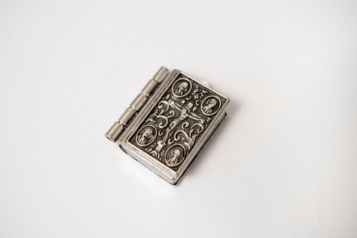 Miniature metal Gospel book locket pendant with Crucifixion and Lords prayer silver tone 2.5x2 cm (0.98x0.78 in) made in Greece