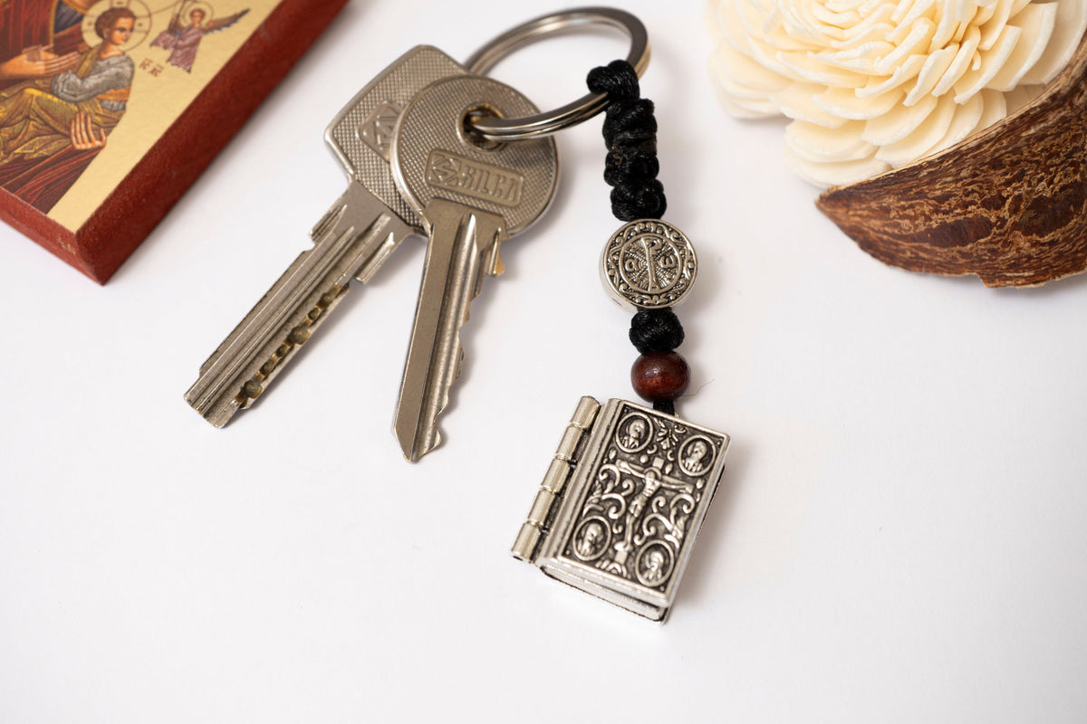 Miniature metal Gospel book locket keychain with knotted cord and Lords prayer 2.5x2 cm (0.98x0.78 in) made in Greece