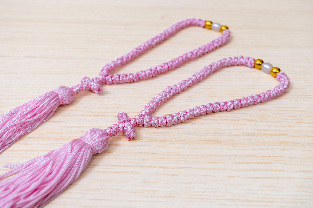 Pink 50 knots prayer rope komboskini with cross tassel and accent bead made in Greece