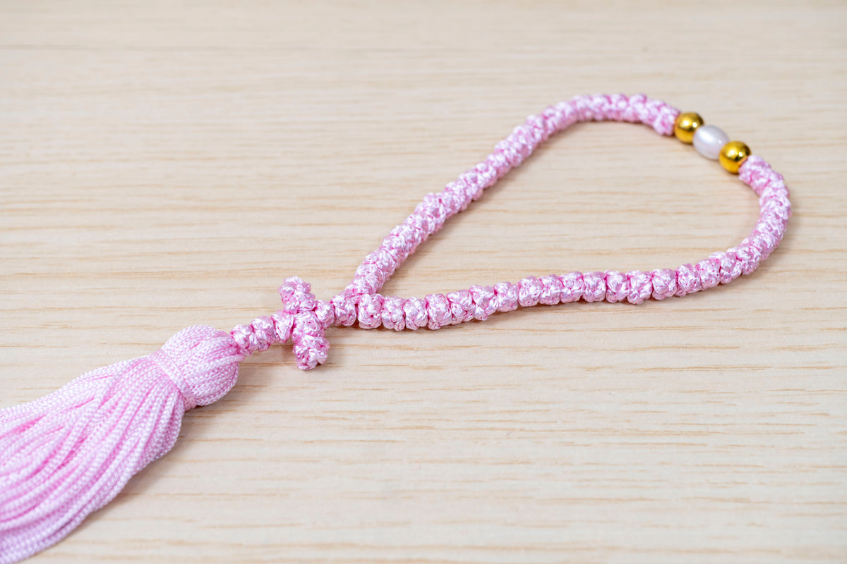 Pink 50 knots prayer rope komboskini with cross tassel and accent bead made in Greece
