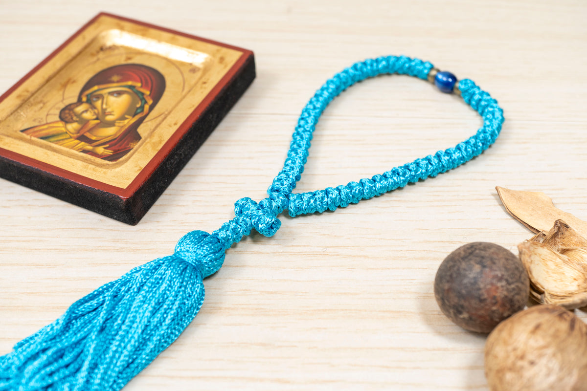 Light blue 50 knots prayer rope komboskini with cross tassel and accent bead made in Greece