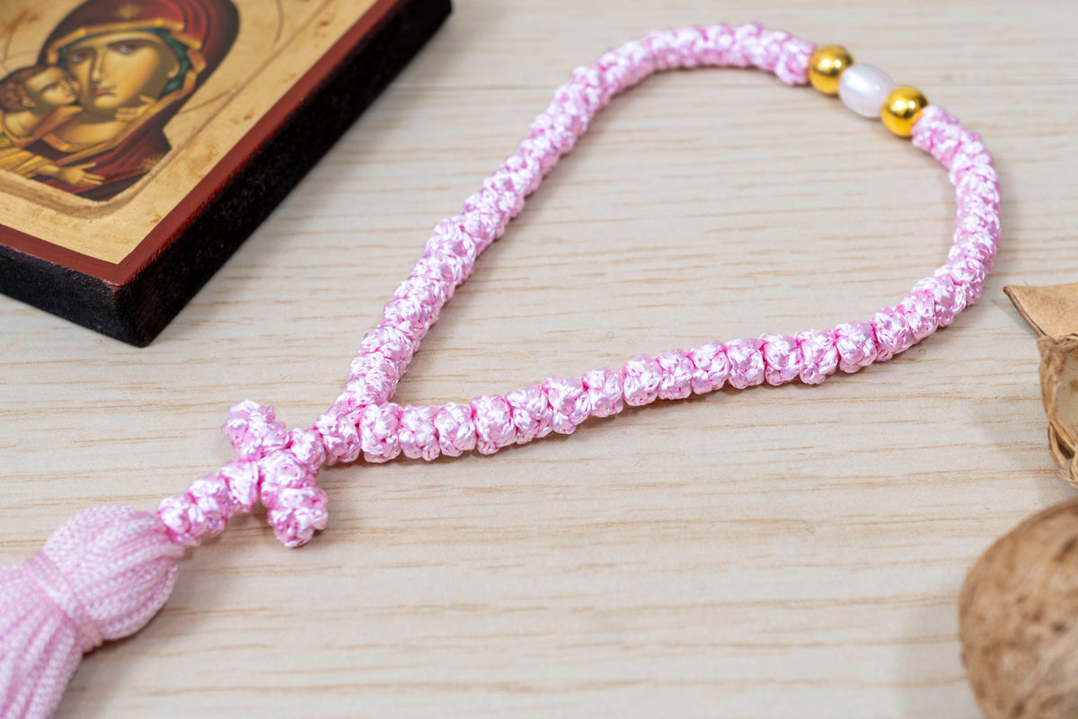 Pink 50 knots prayer rope komboskini with cross tassel and accent bead made in Greece