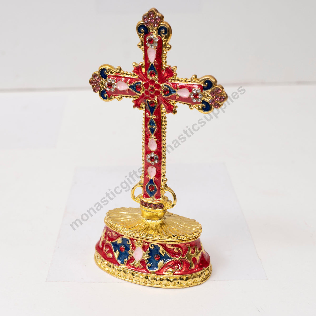 Tabletop standing cross trinket box with red enamel gold filigree and crystals on decorative base