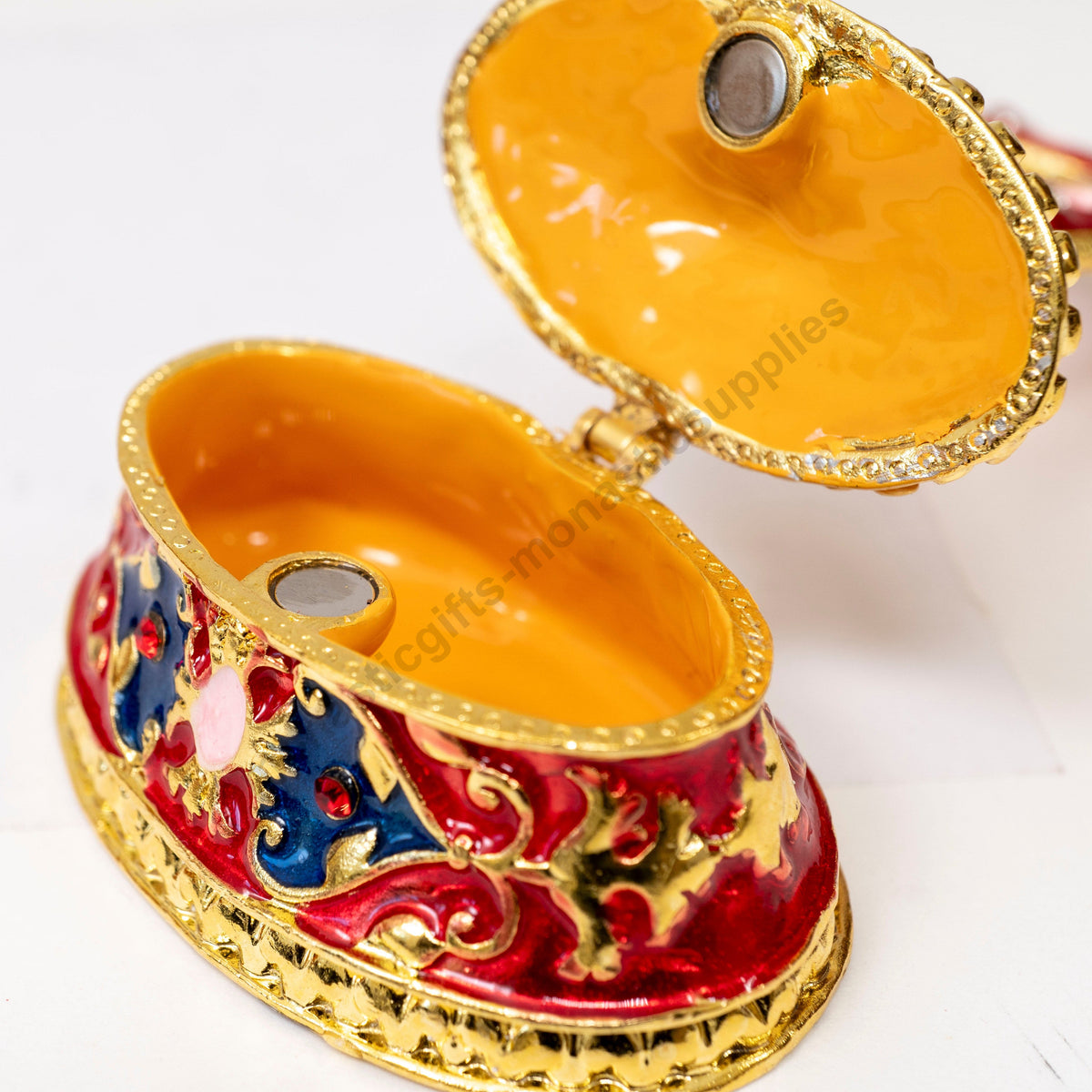 Tabletop standing cross trinket box with red enamel gold filigree and crystals on decorative base
