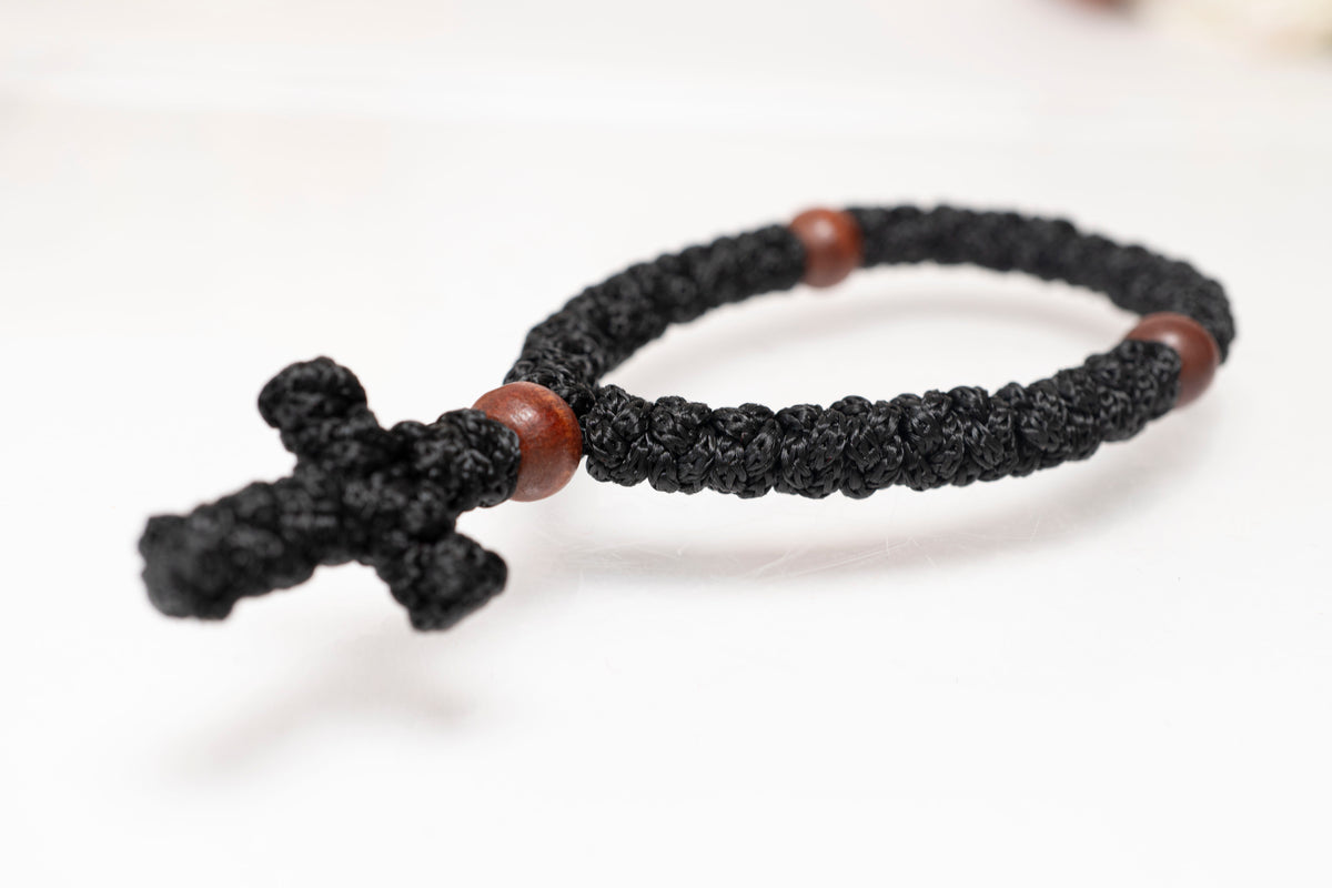 Hand knotted black prayer rope komboskini with 33 knots and wooden beads made in Greece