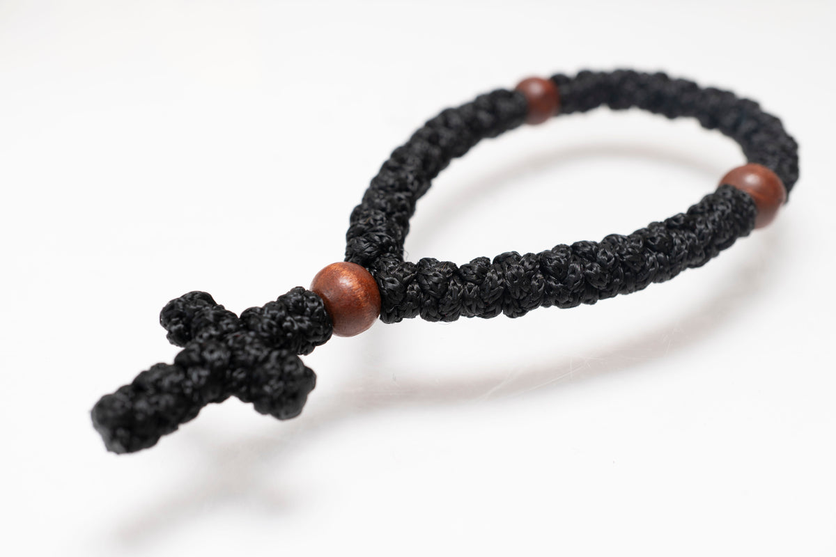 Hand knotted black prayer rope komboskini with 33 knots and wooden beads made in Greece