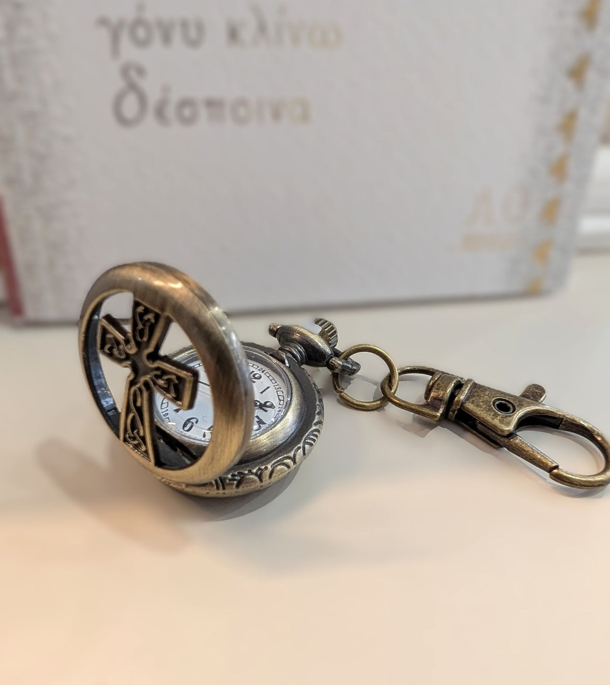 Mini pocket watch keychain antique bronze with cutout cross front and swivel bag clip