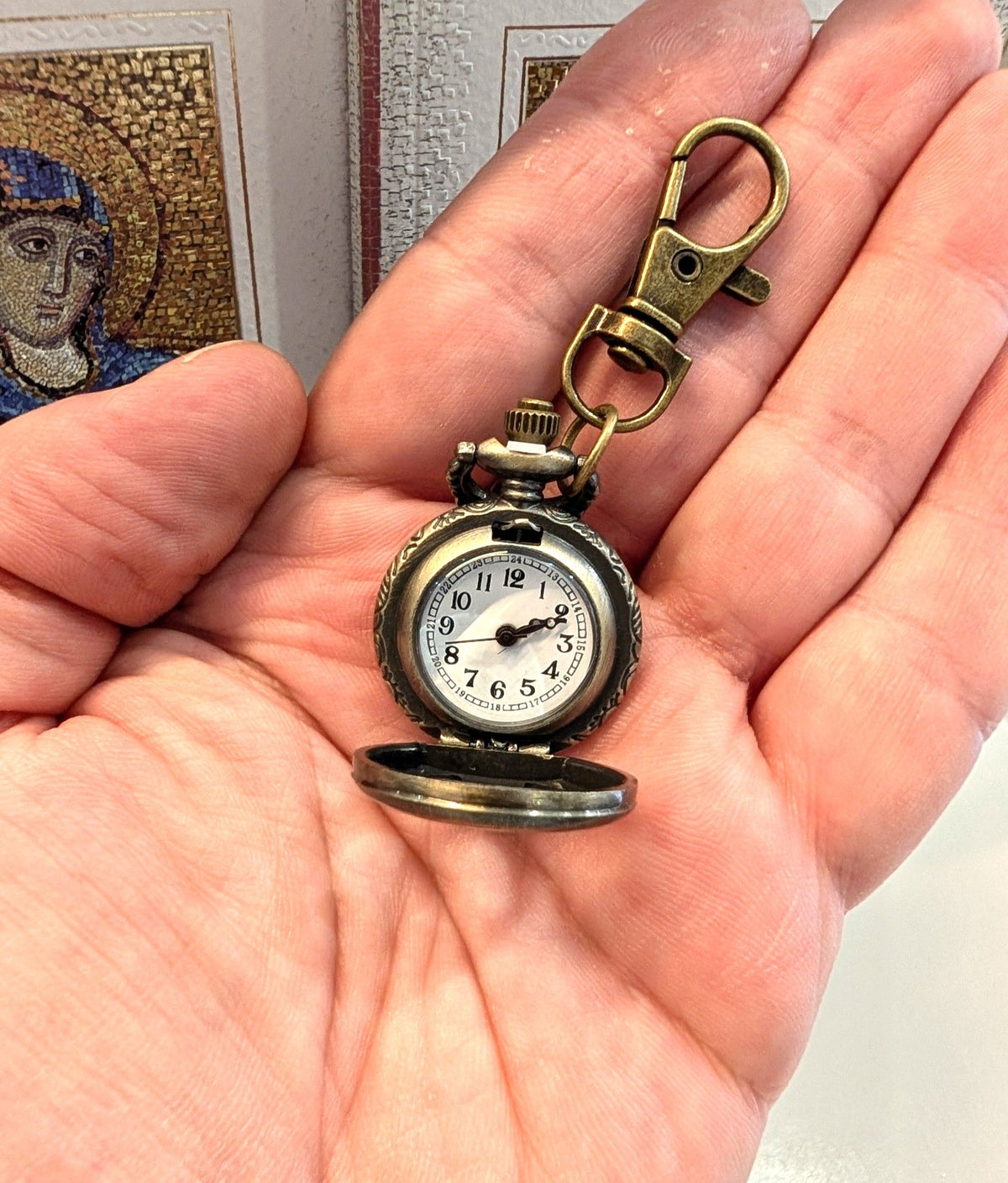 Mini pocket watch keychain antique bronze with cutout cross front and swivel bag clip
