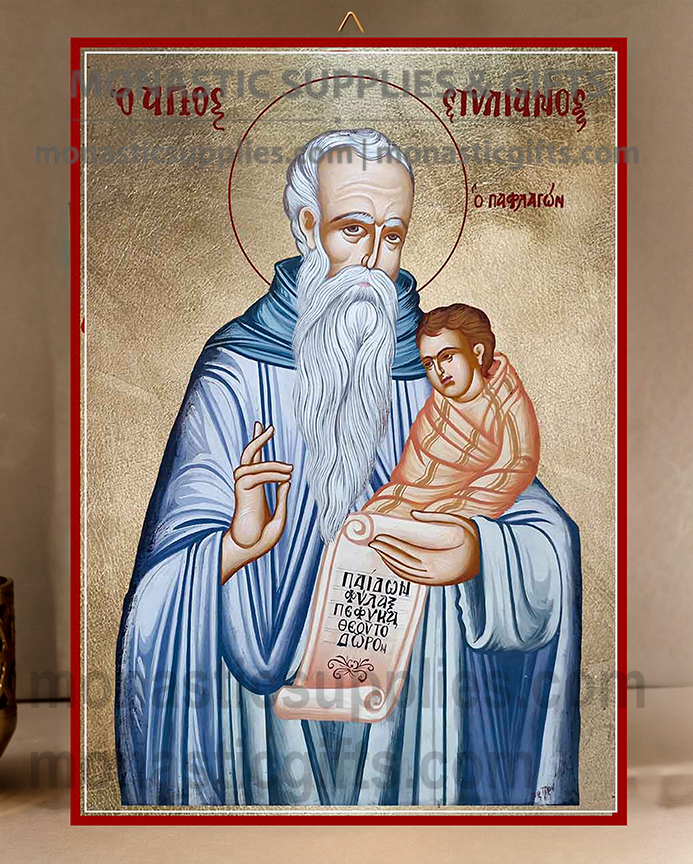 Handcrafted Orthodox gold leaf canvas icon of Saint Stylianos holding a swaddled child patron of infants on solid wooden panel
