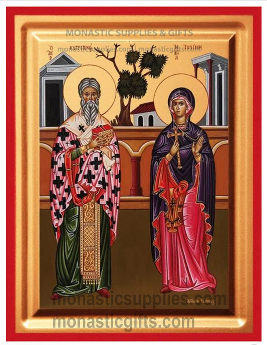 Byzantine Orthodox icon of St. Cyprian and St. Justina on gold leaf canvas with a red border.