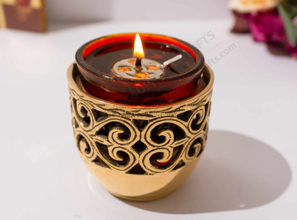 Solid brass vigil lamp standing oil burner with ornate cut out pattern and heat resistant red glass cup