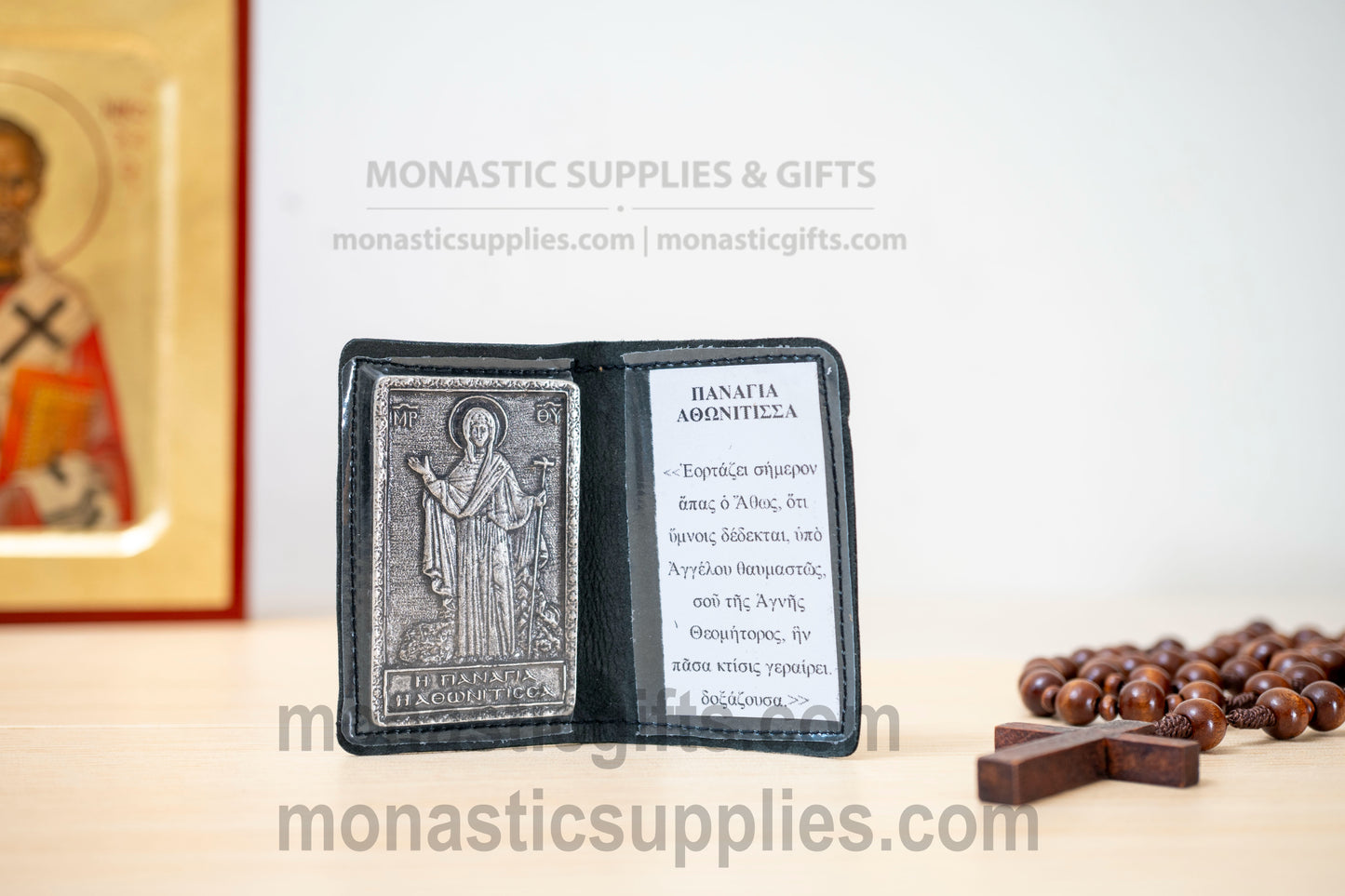 black leather pocket diptych with an antique metal relief icon of Panagia Athonitissa (Virgin Mary of Mount Athos