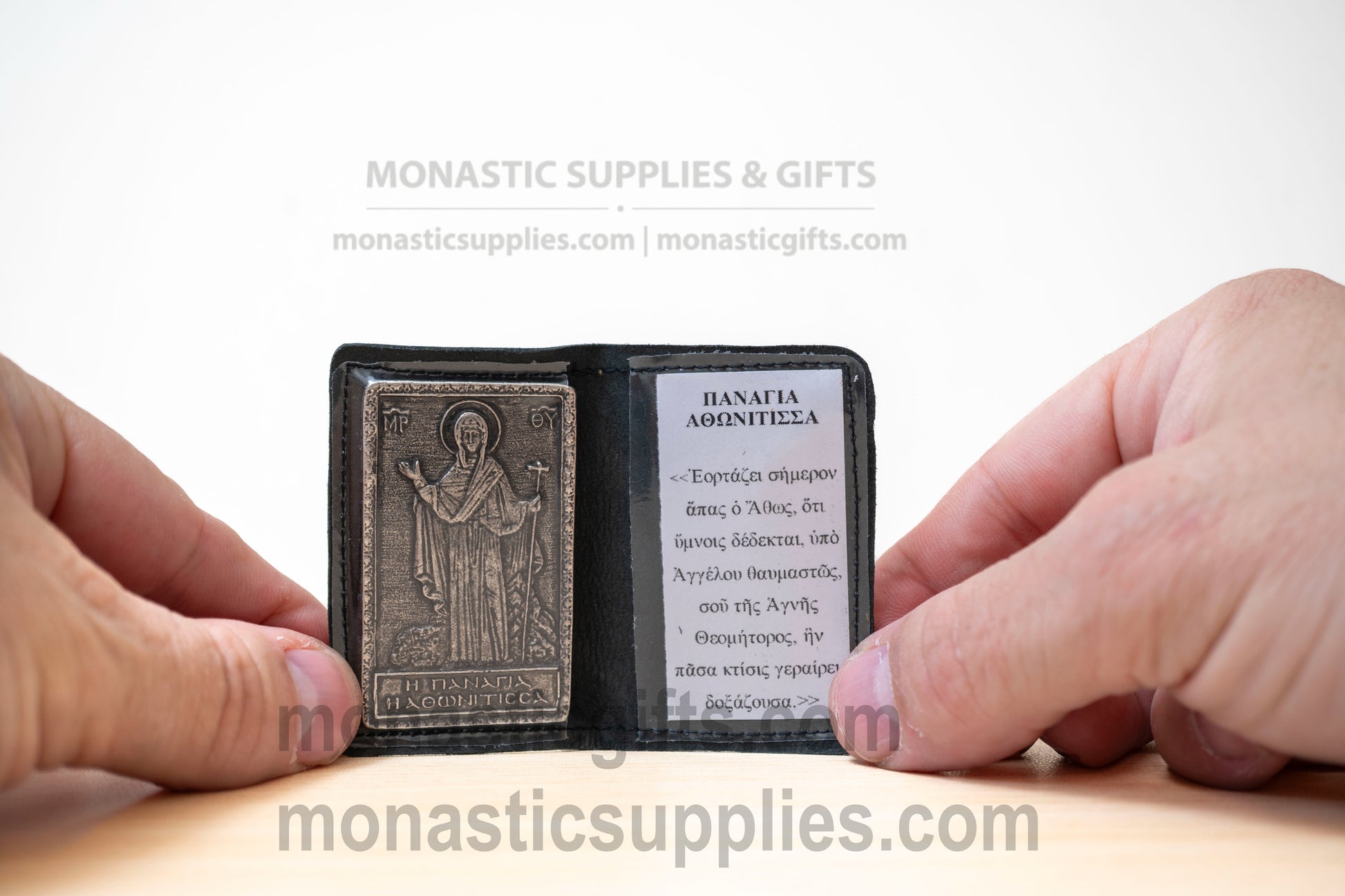 black leather pocket diptych with an antique metal relief icon of Panagia Athonitissa Virgin Mary of Mount Athos