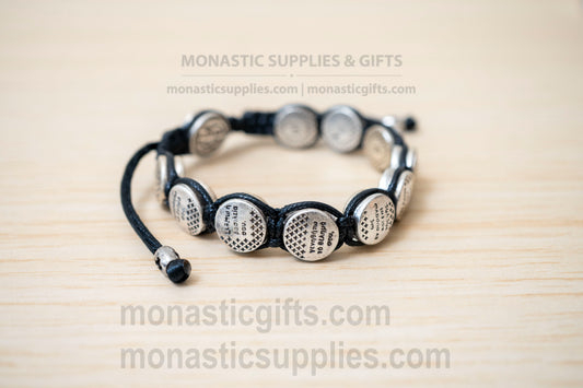 Orthodox macrame bracelet with silver beads engraved with the Lord's Prayer.