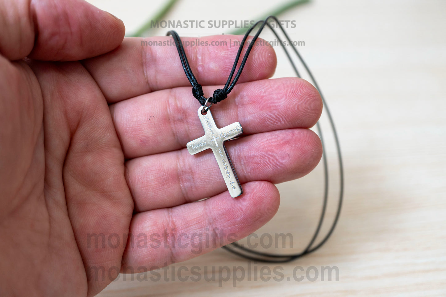 Orthodox Silver metallic cross necklace engraved with the Jesus Prayer in Greek.