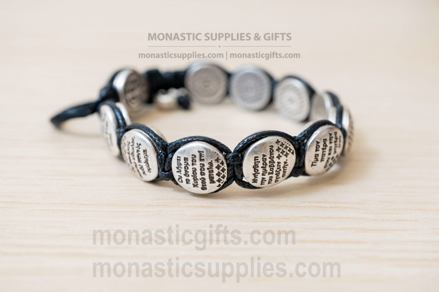 Orthodox macrame bracelet with silver beads engraved with the Ten Commandments.