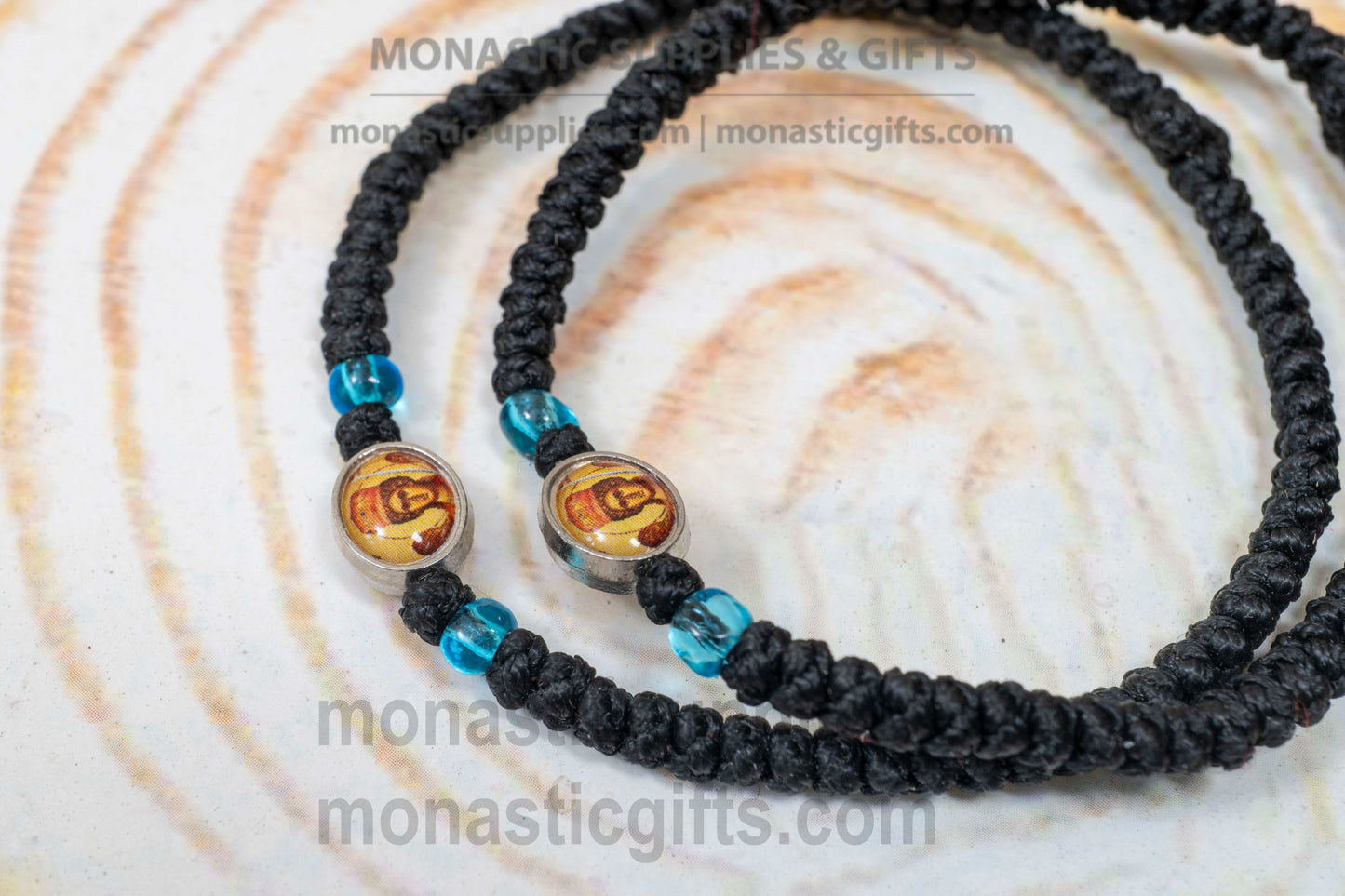 Handcrafted Orthodox black waxed cord 33 knot prayer rope bracelet with tiny Archangel Michael icon medallion and blue beads