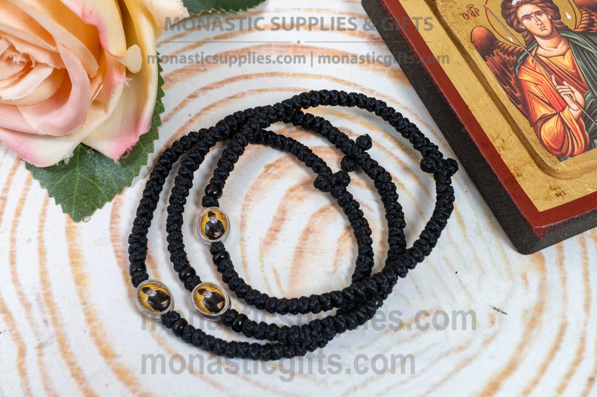 Handcrafted Orthodox black waxed cord 33 knot prayer rope bracelet with tiny Saint Paisios icon medallion and knotted cross