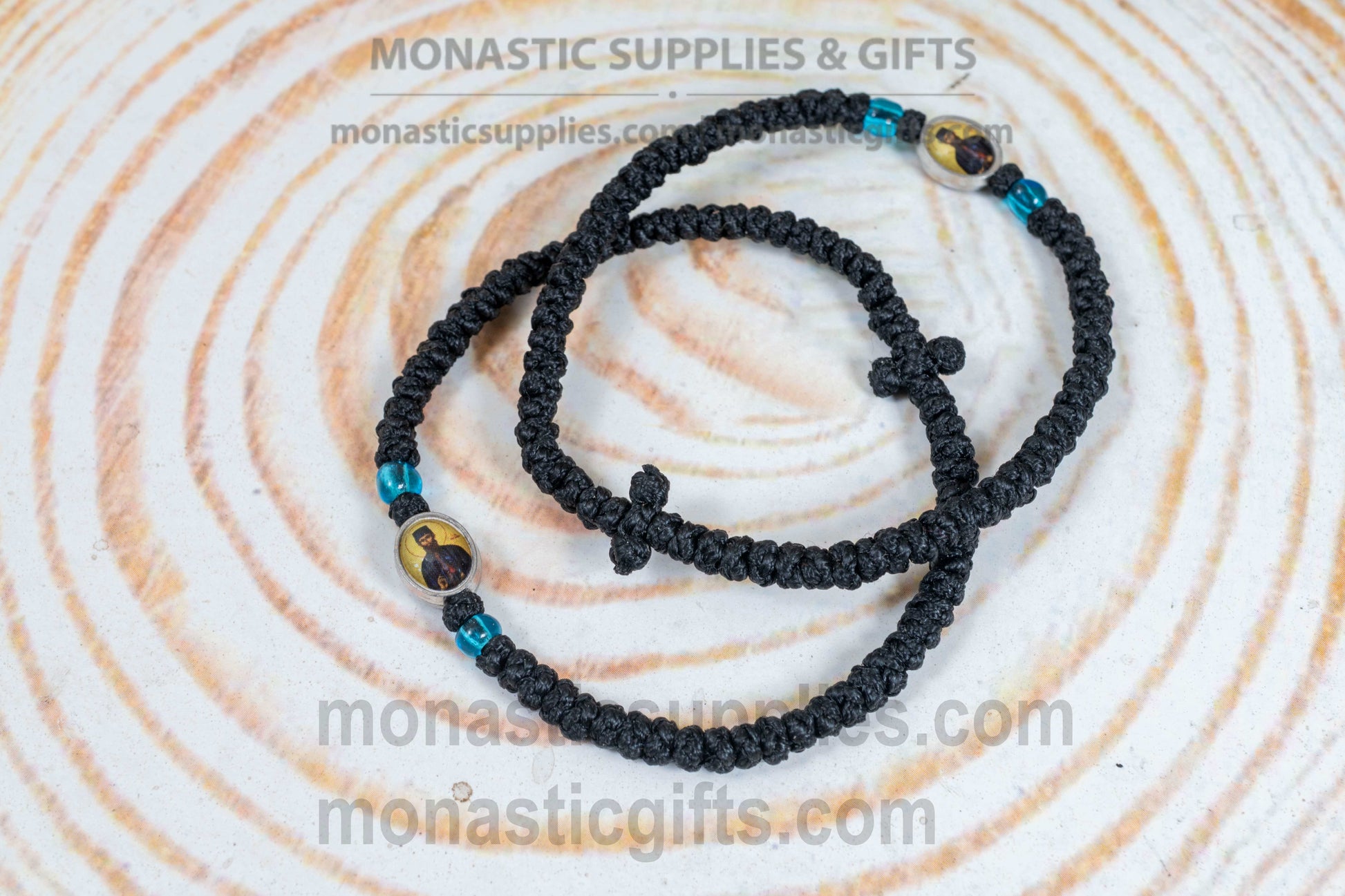 Handcrafted Orthodox black waxed cord 33 knot prayer rope bracelet with tiny Saint Ephraim icon medallion and knotted cross
