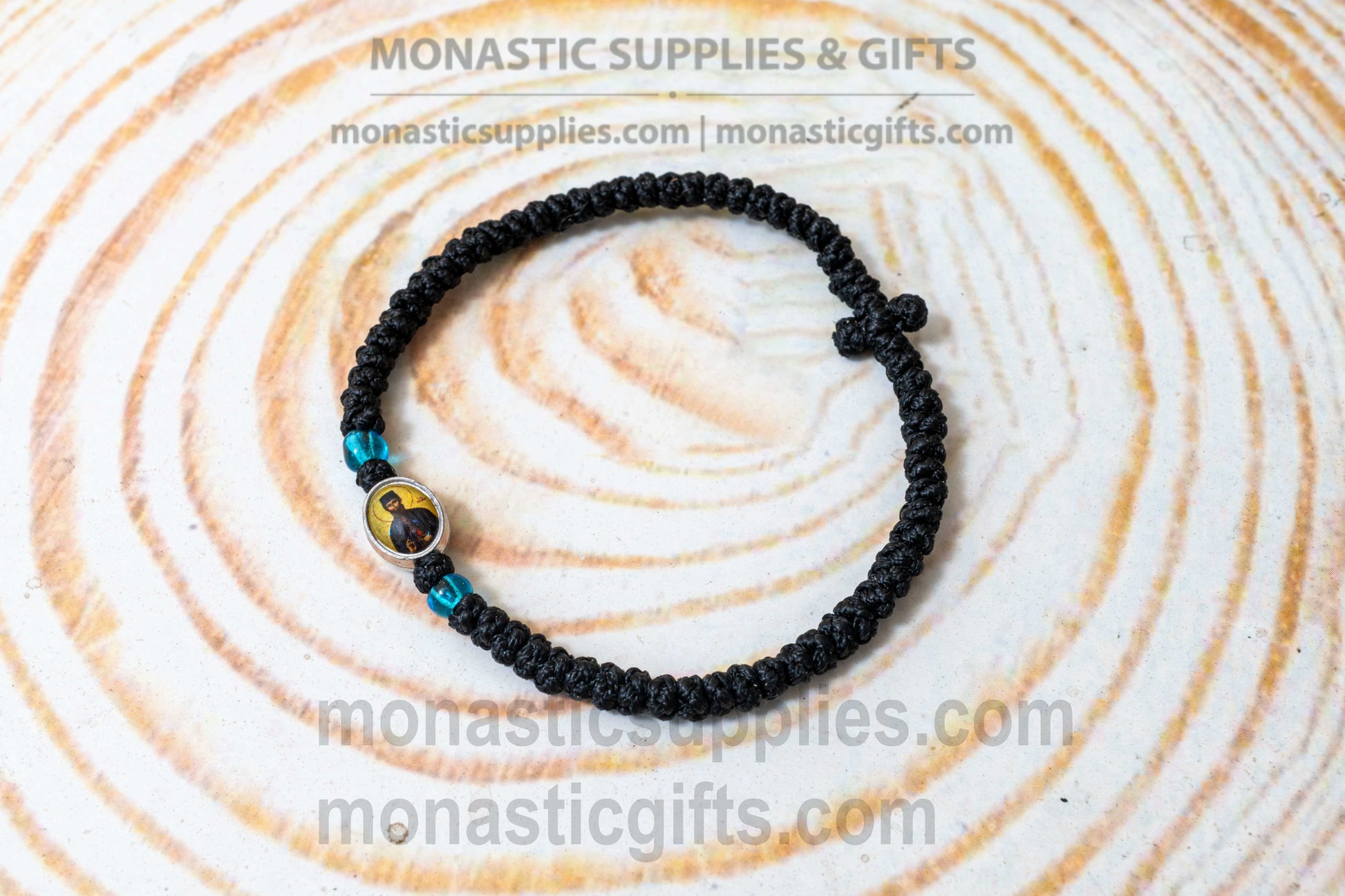 Handcrafted Orthodox black waxed cord 33 knot prayer rope bracelet with tiny Saint Ephraim icon medallion and knotted cross
