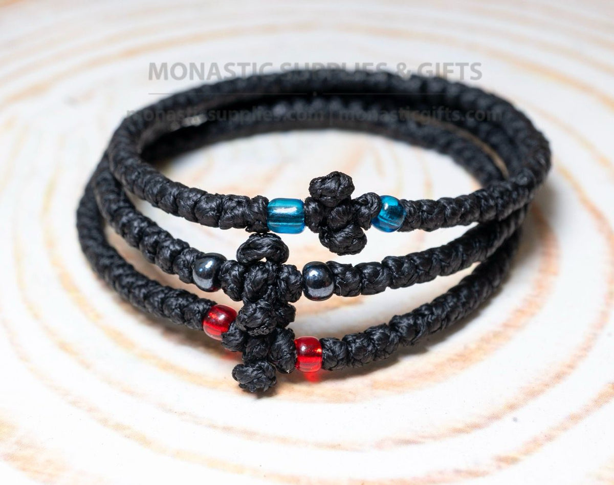 Classic Greek prayer rope komboskini bracelets set of 3 with 50 knots knotted cross and blue black and red beads in black waxed cord orthodox made in Greece