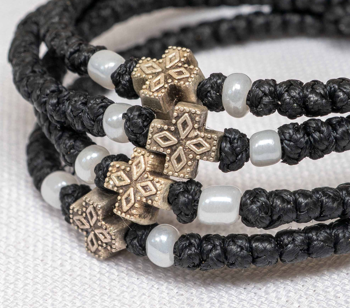 Monastic style prayer rope bracelet 1 piece with 50 knots ornate silver cross bead and white pearl beads in black waxed cord orthodox made in Greece
