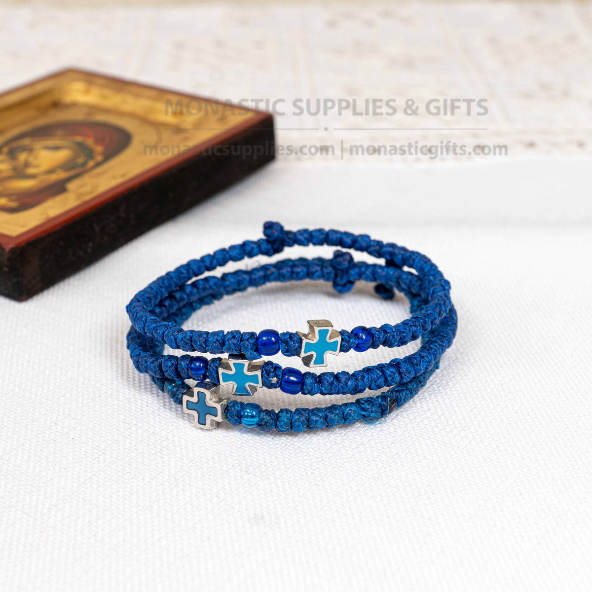 Monastic style prayer rope bracelet 1 piece with 50 knots silver cross bead turquoise enamel and translucent blue beads in deep blue waxed cord orthodox made in Greece
