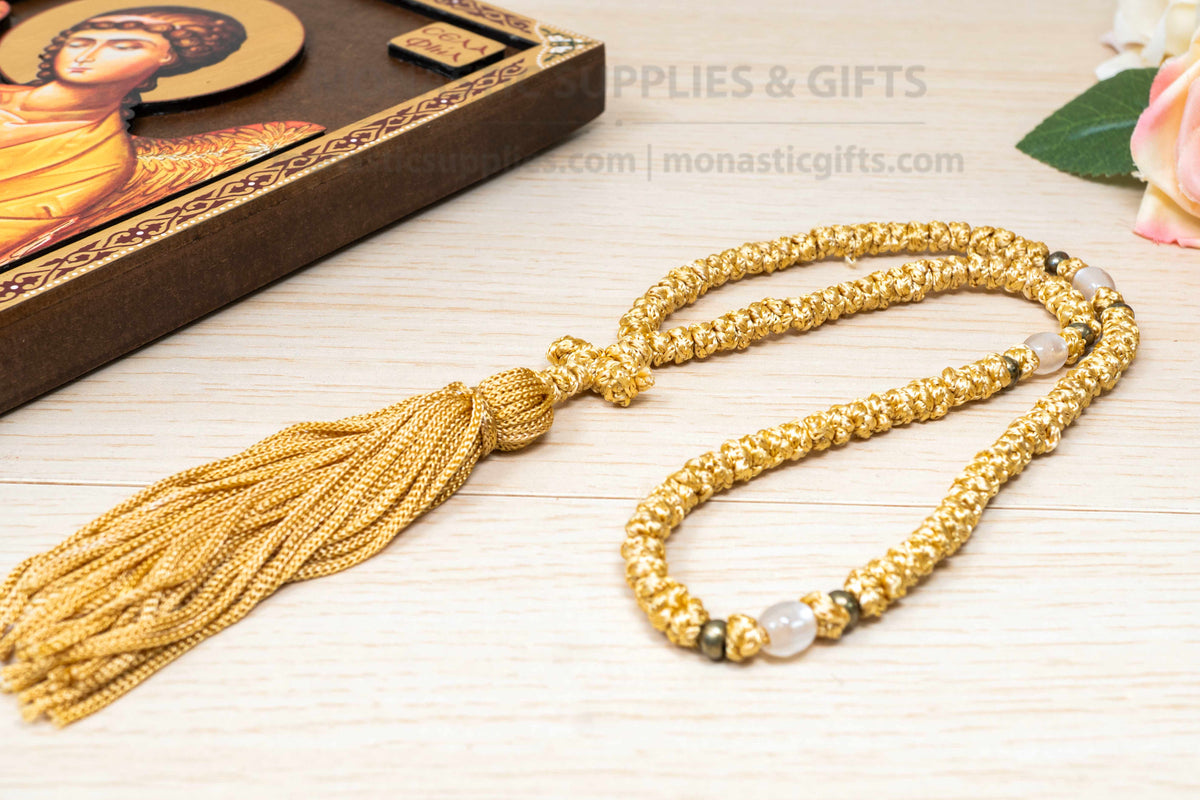 Gold 100 knots prayer rope komboskini with white divider beads and knotted cross made in Greece