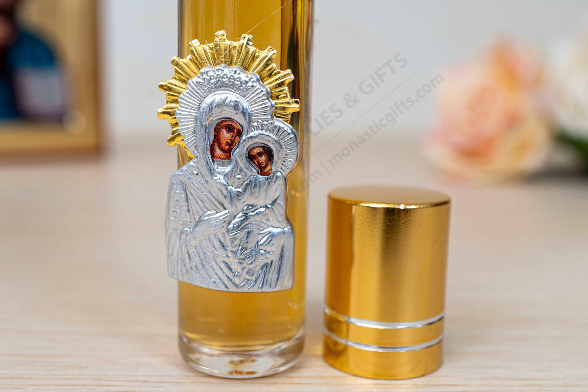 Tinos island anointing oil roll on handcrafted Virgin Mary metal icon with gold plated halo accent