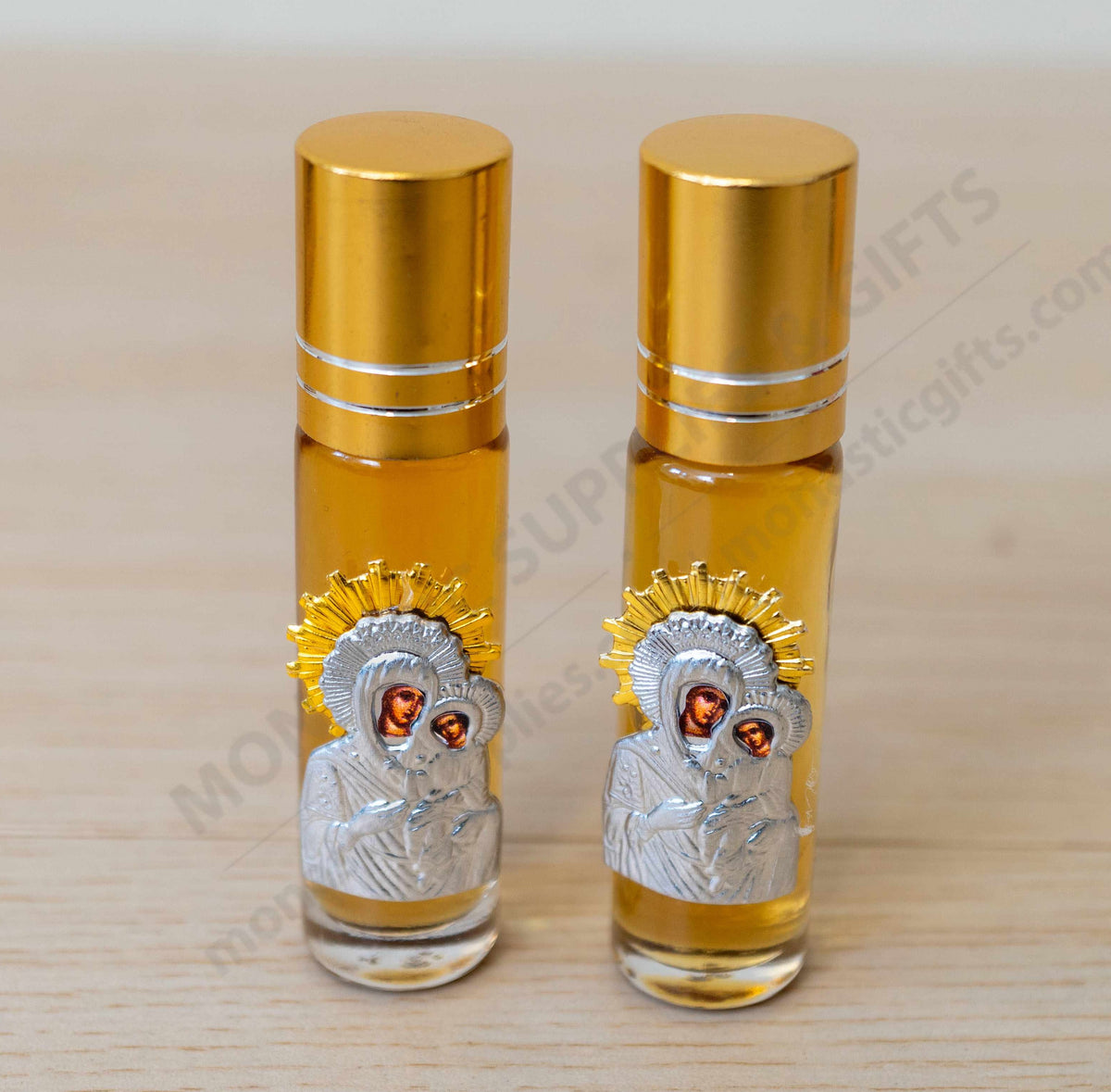 Tinos island anointing oil roll on handcrafted Virgin Mary metal icon with gold plated halo accent
