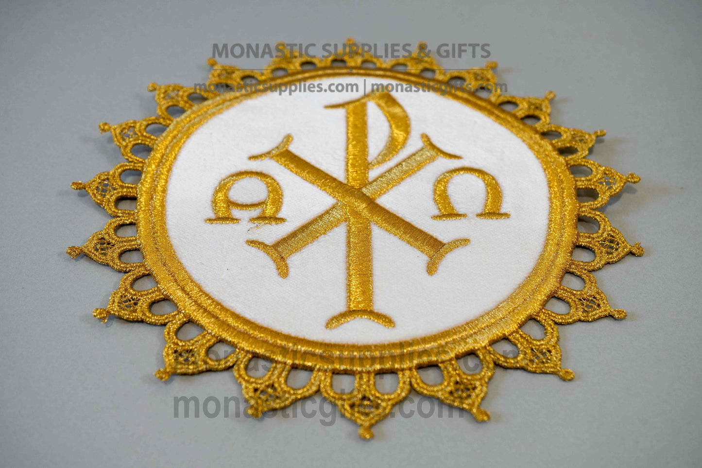 Handcrafted round white velvet altar mat ripidion with gold embroidered Chi-Rho and lace trim for censers and candlesticks made in Greece