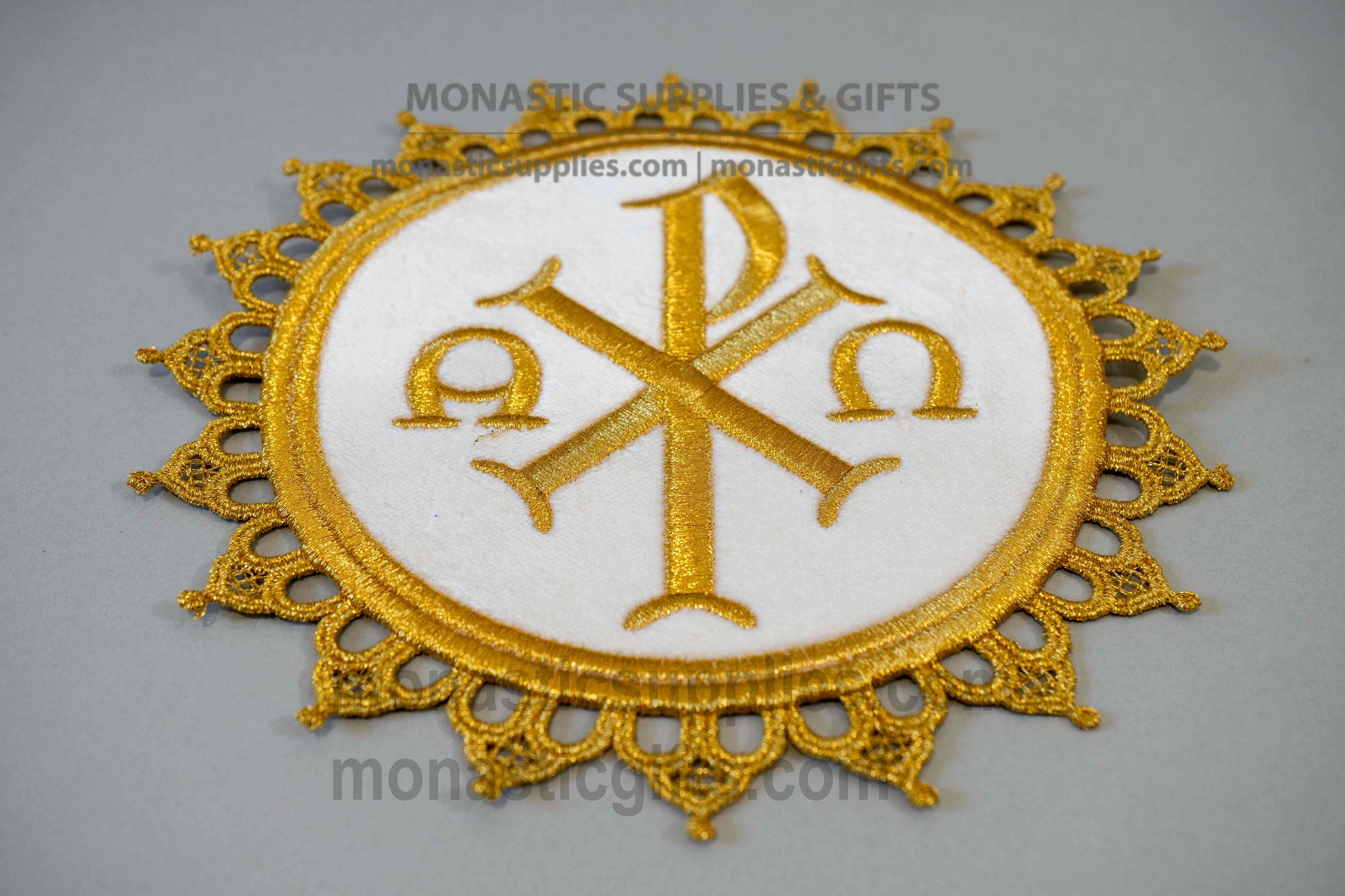 Handcrafted round white velvet altar mat ripidion with gold embroidered Chi-Rho and lace trim for censers and candlesticks made in Greece