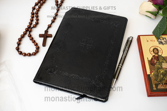 Orthodox embossed leather notebook set featuring an elastic band closure, ribbon bookmark, hidden back compartment, and a luxury Jesus Prayer inscribed pen.