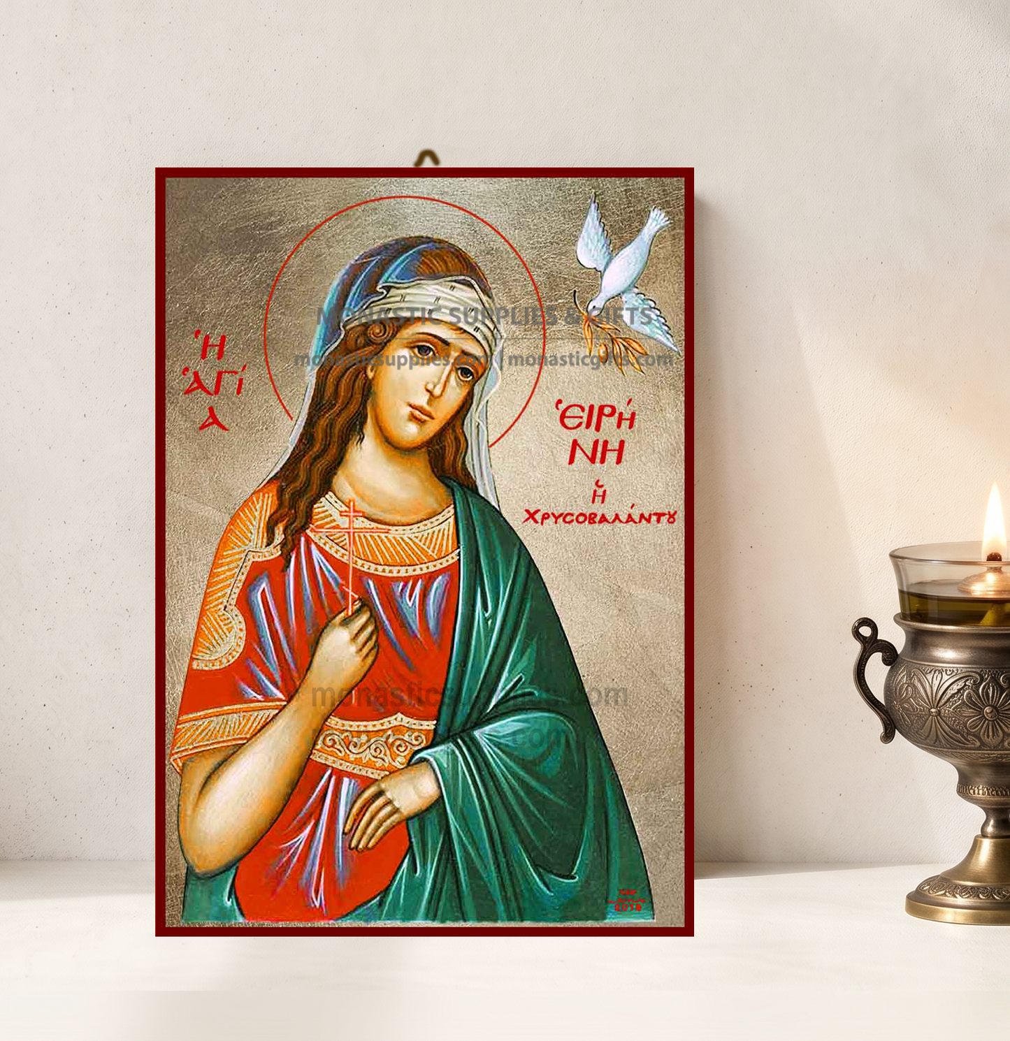 Handcrafted Orthodox gold leaf canvas icon of Saint Irene the Great Martyr with dove and cross on solid wooden panel