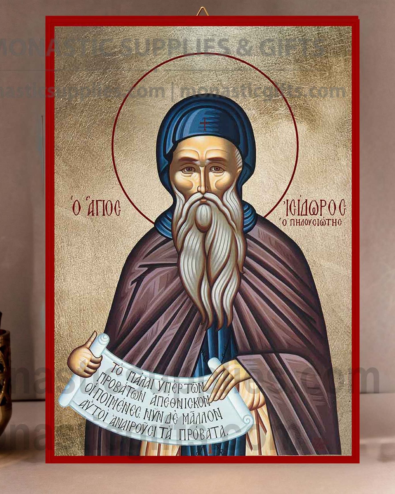 Handcrafted Orthodox gold leaf canvas icon of Saint Isidore on solid wooden panel