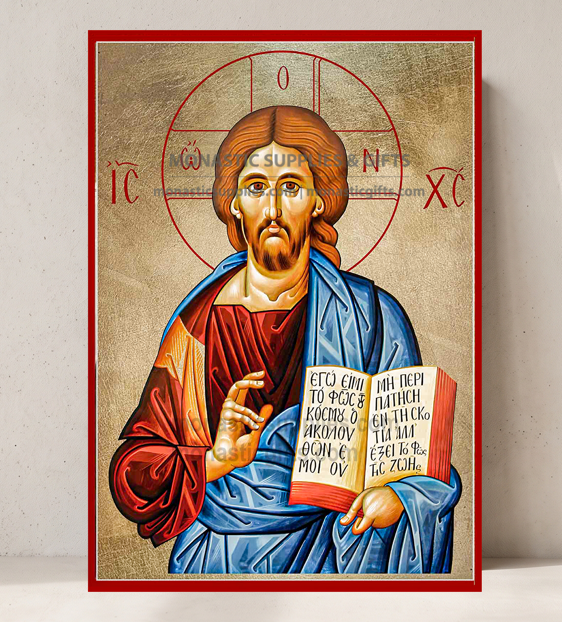 Handcrafted Orthodox gold leaf canvas icon of Jesus Christ the Blessing Pantocrator holding open Gospel book on solid wooden panel