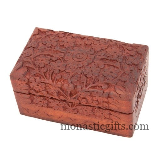 Handcrafted vintage walnut wood keepsake box featuring intricate geometric relief carvings and a moisture-resistant clear varnish finish.