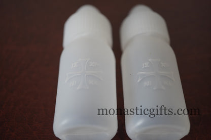 Plastic Bottles 2pcs With Cross on it you can fill it  with anointing oil or Holy water Gift of faith, hope and love