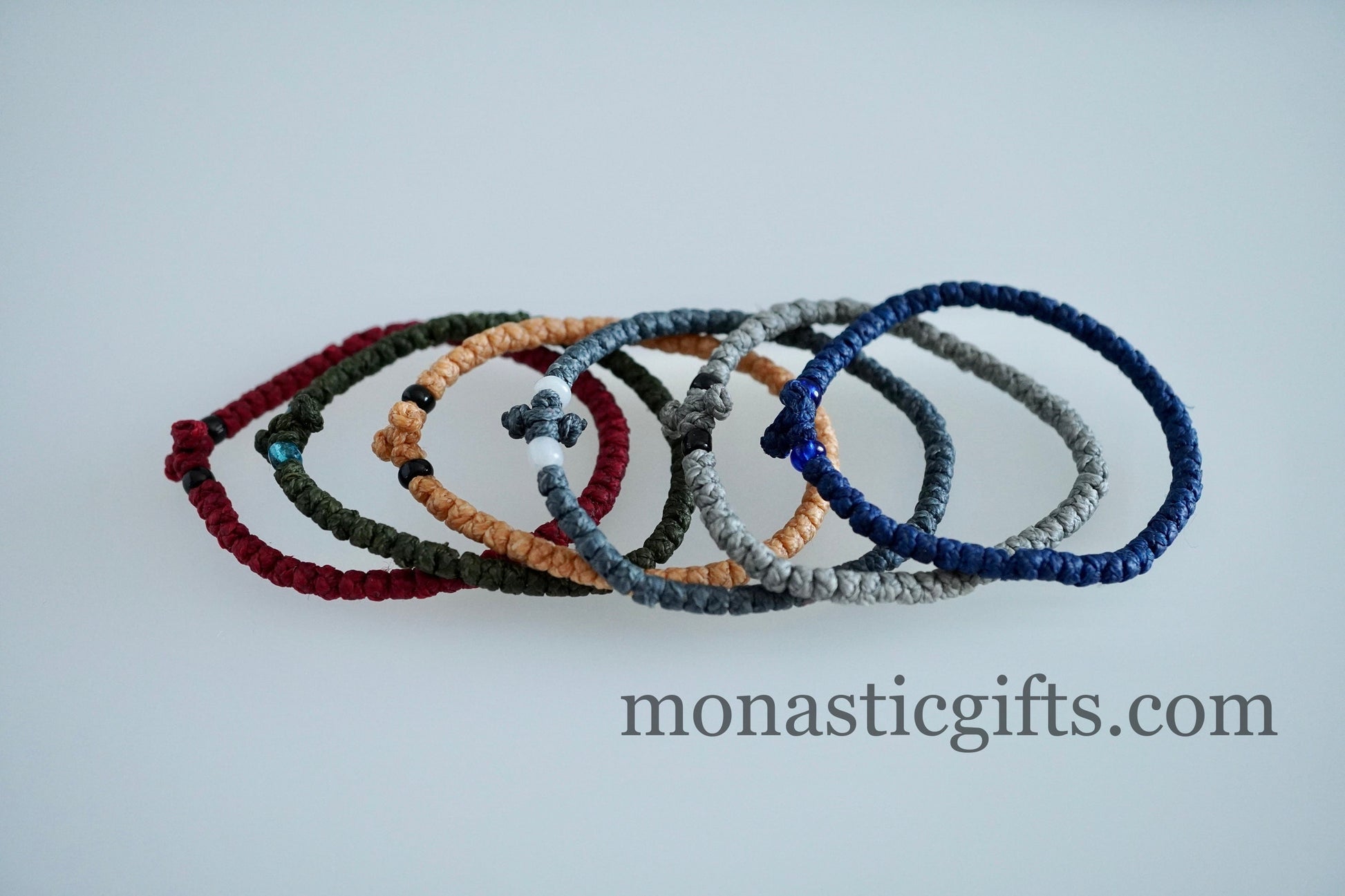 Adjustable waterproof Greek Orthodox waxed prayer bracelet komboskini with thin knots and beads.
