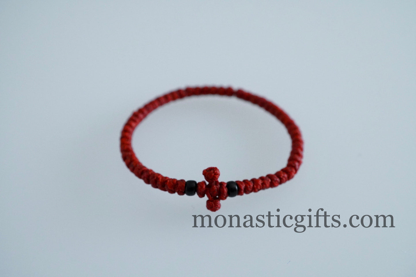 Adjustable waterproof Greek Orthodox waxed prayer bracelet komboskini with thin knots and beads.